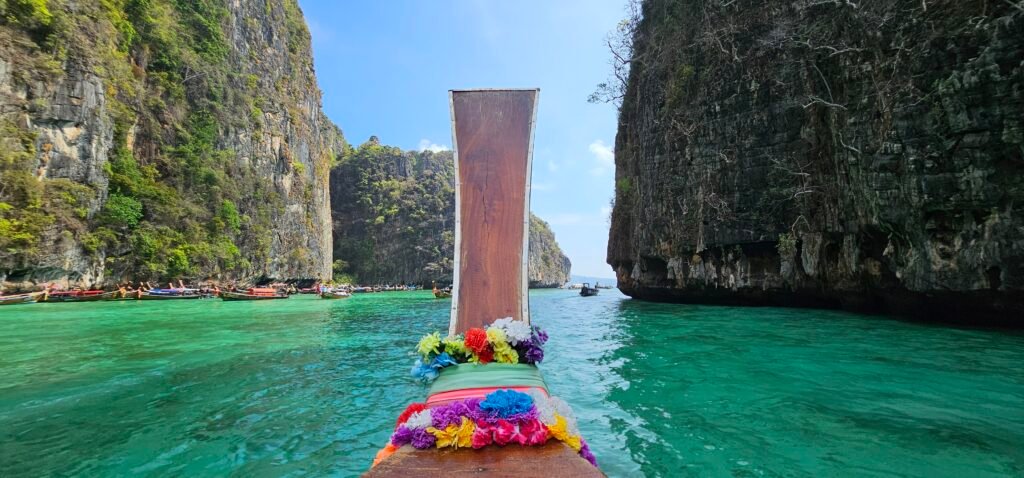 Long Tail Boat at Phi Phi Island just before rain the clear sky. rainy season. Thailand