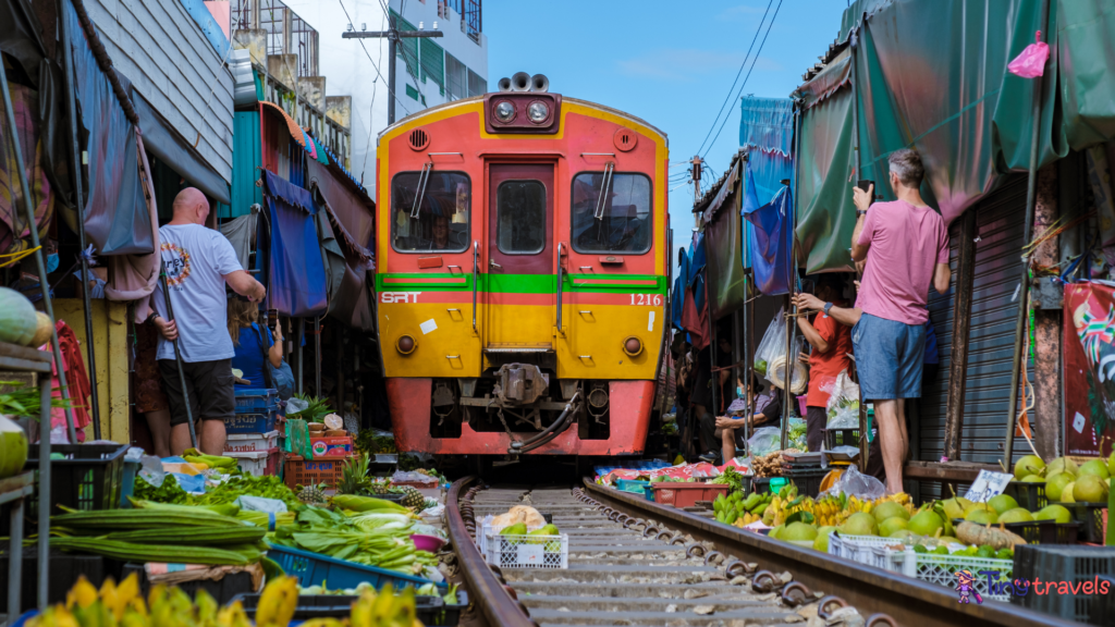 maeklong railway market
maeklong railway market location
mae klong
how to go to maeklong railway market
maeklong railway market bangkok