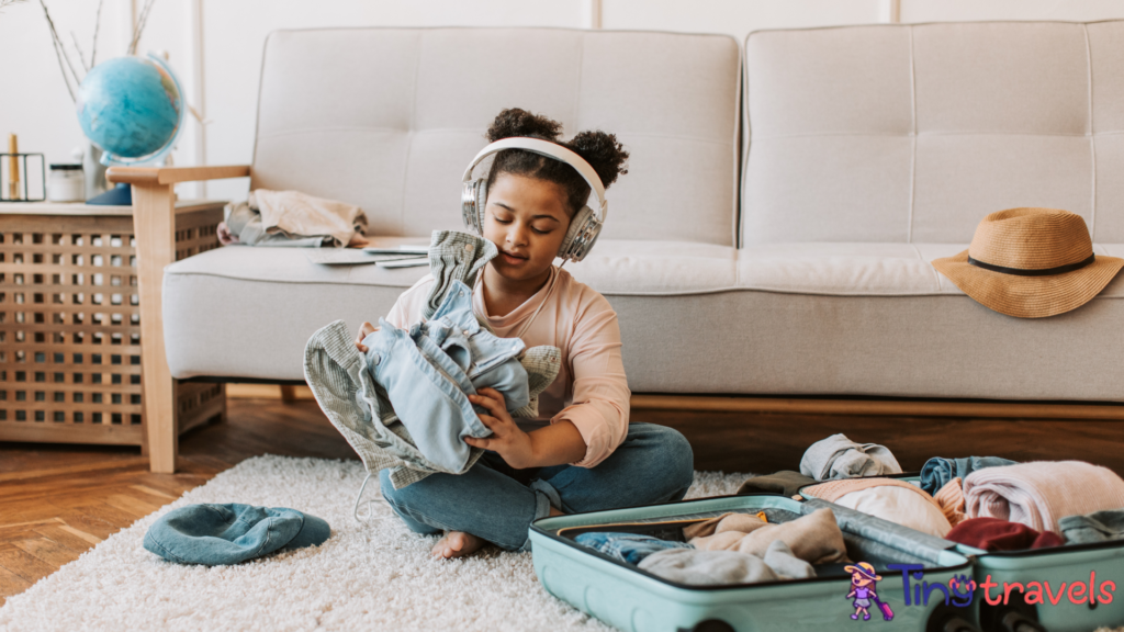 Kid with Headphones Packing Her Clothes⁠ 