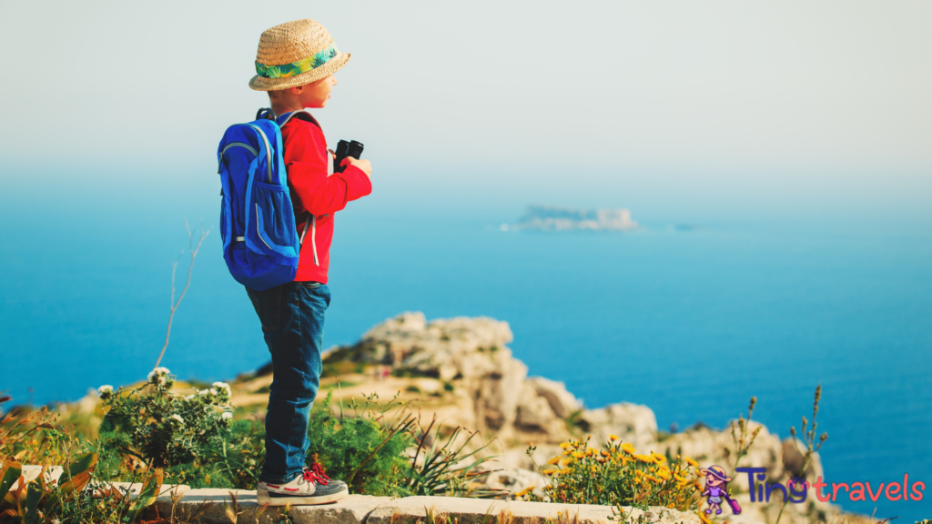 little boy hiking in mountains, kids travel⁠
