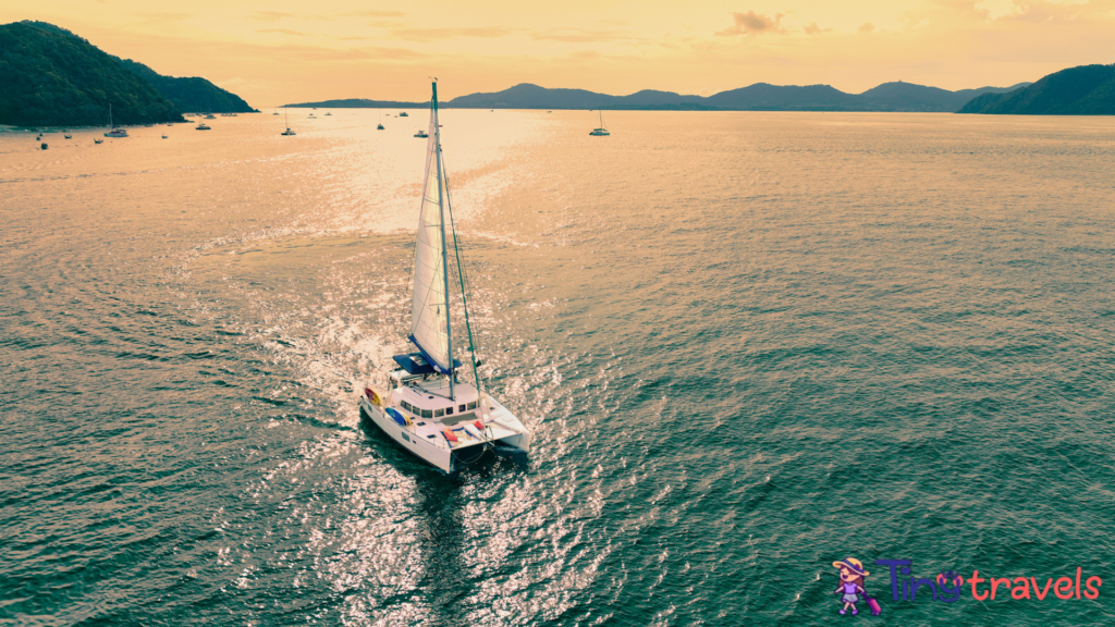 Aerial view of a catamaran on the andaman seas. Sailing in Phuket, Thailand., Luxury Yacht Charters in Thailand