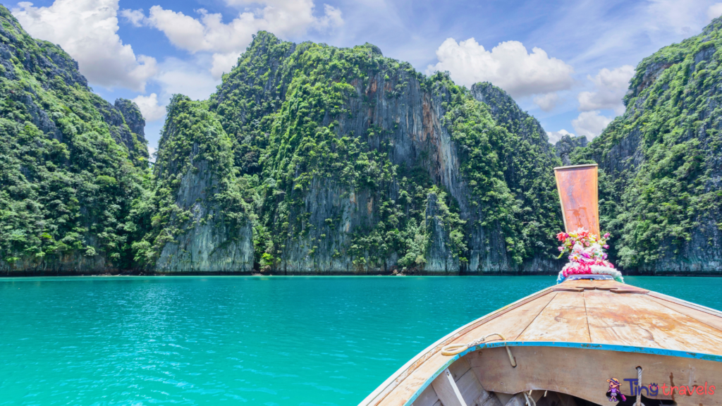 Traditional longtail boat with beautiful scenery view at Maya Bay on Phi Phi Leh Island in sunshine day.⁠