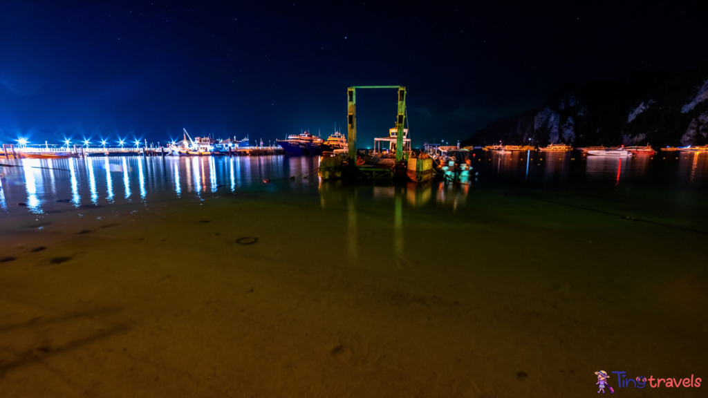 Boats and ferries at the port of Phi Phi Island at night⁠
