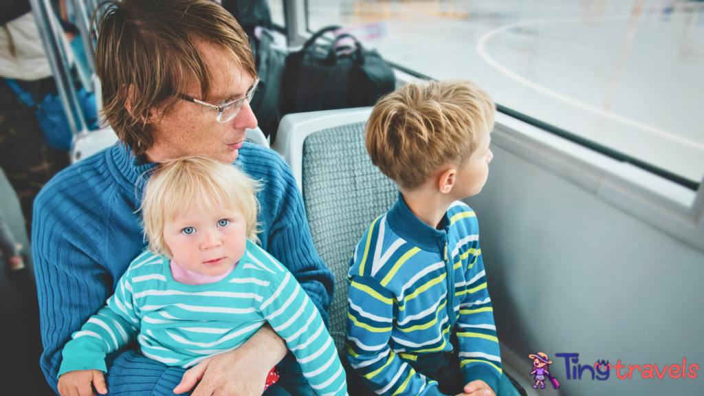 father with kids travel by bus, family using public transport⁠
